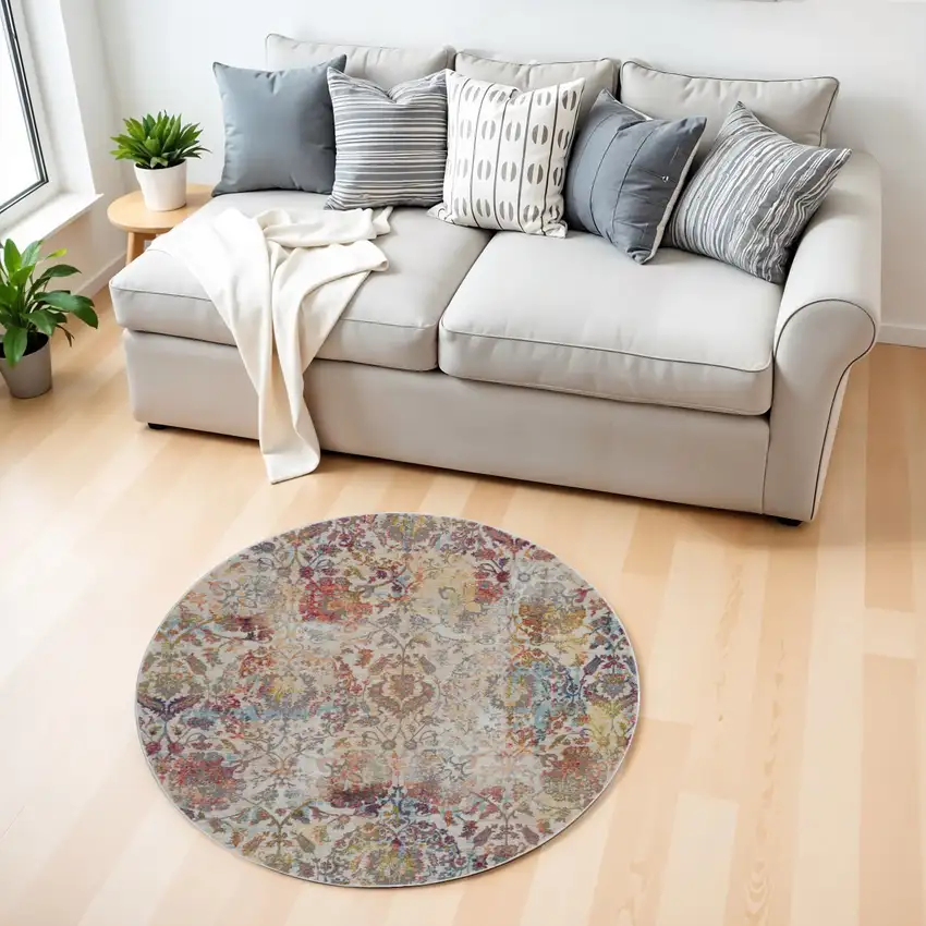 4' Orange and Ivory Floral Distressed Non Skid Round Rug Photo 1