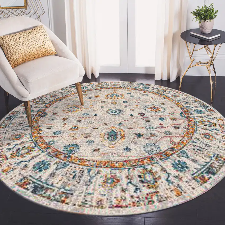 7' Orange and Ivory Round Floral Power Loom Area Rug Photo 7