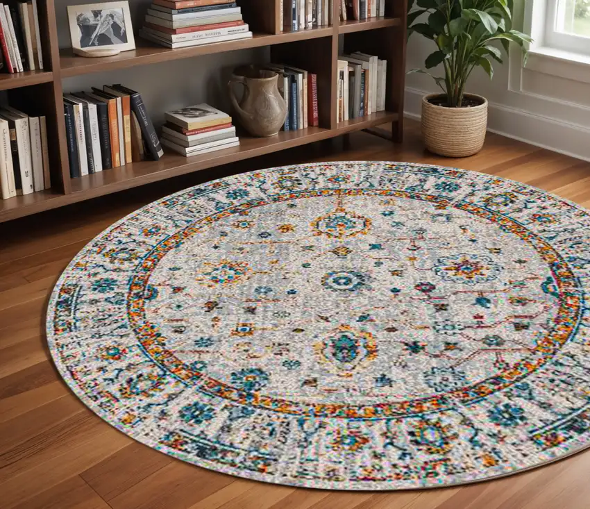 7' Orange and Ivory Floral Power Loom Round Rug Photo 1