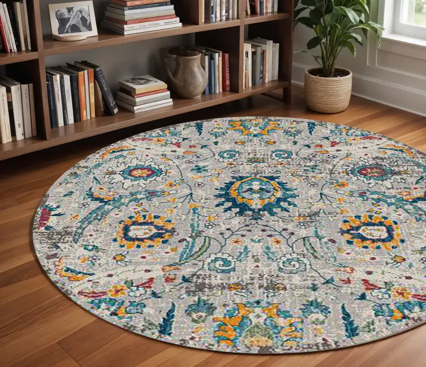 7' Orange and Ivory Floral Power Loom Round Rug Photo 1