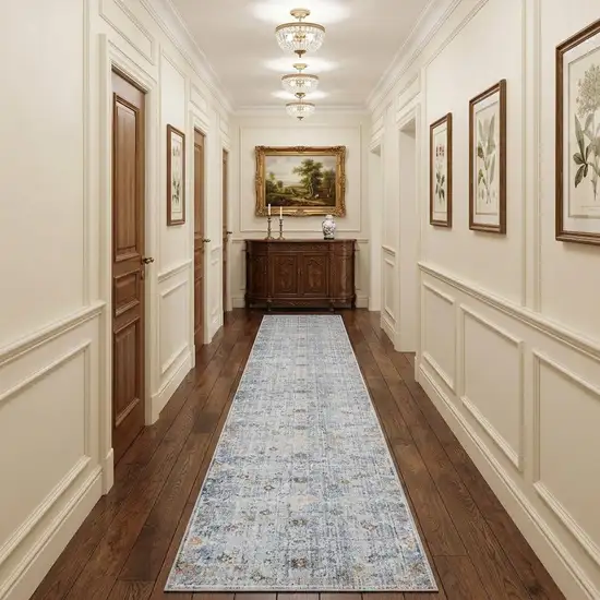 12' Blue and Ivory Oriental Power Loom Distressed Runner Rug Photo 1