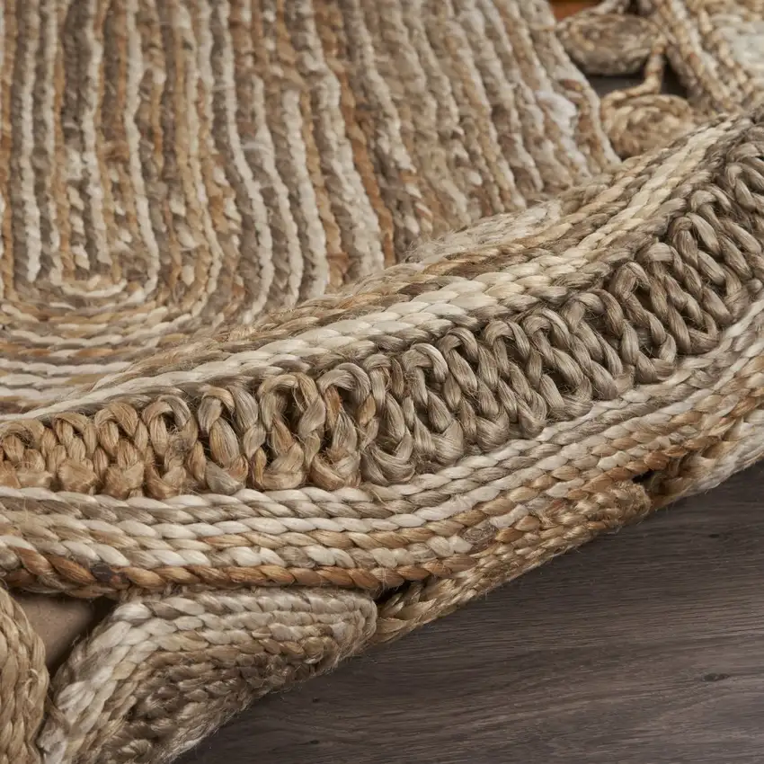 9' Oval Shaped Natural Toned Area Rug Photo 4