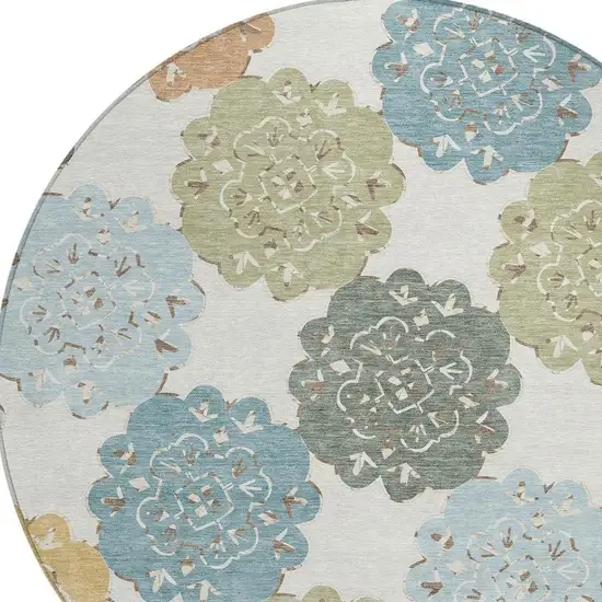 8' Pacific Blue Ivory And Copper Round Quatrefoil Washable Indoor Outdoor Area Rug Photo 7