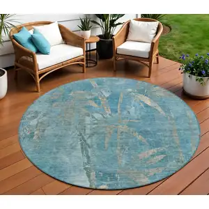 Photo of 8' Pale Aqua And Beige Round Botanical Leaves Washable Indoor Outdoor Area Rug