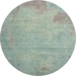 Photo of 8' Pale Aqua And Taupe Abstract Washable Round Rug With UV Protection