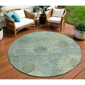 Photo of 8' Pale Aqua And Wheat Round Floral Washable Indoor Outdoor Area Rug