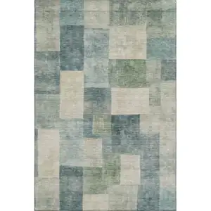 Photo of 8' Pale Aqua Blue And Ivory Geometric Washable Area Rug With UV Protection