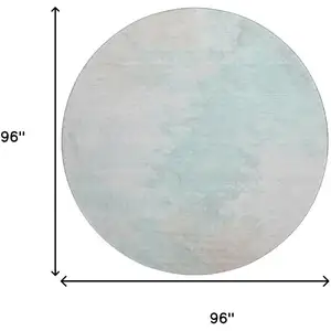 Photo of 8' Pale Aqua Gray And Ivory Abstract Washable Round Rug With UV Protection