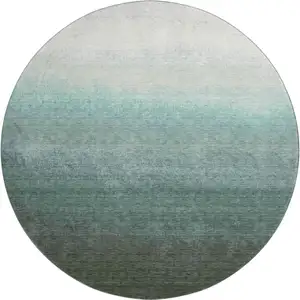 Photo of 8' Pale Aqua Gray And Ivory Ombre Washable Round Rug With UV Protection