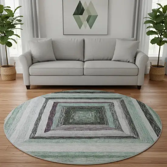 8' Pale Aqua Ivory And Gray Geometric Washable Round Rug With UV Protection Photo 2
