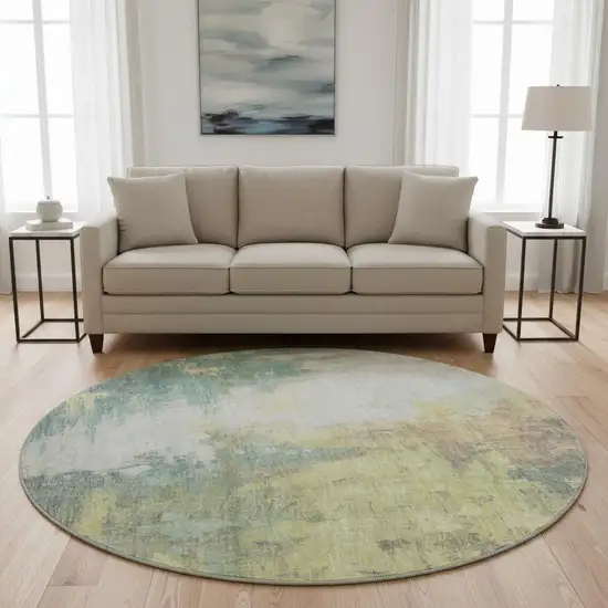 8' Pale Aqua Ivory And Teal Abstract Washable Round Rug With UV Protection Photo 2