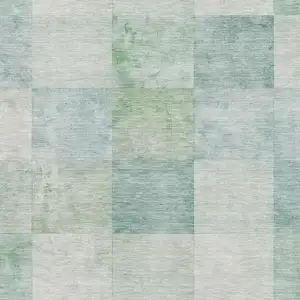 Photo of 8' Pale Aqua Mint Green And Ivory Geometric Washable Area Rug With UV Protection