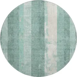 Photo of 8' Pale Aqua Teal And Beige Striped Washable Round Rug With UV Protection