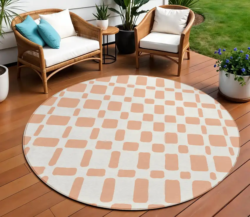 8' Peach And Beige Round Geometric Washable Indoor Outdoor Area Rug Photo 1