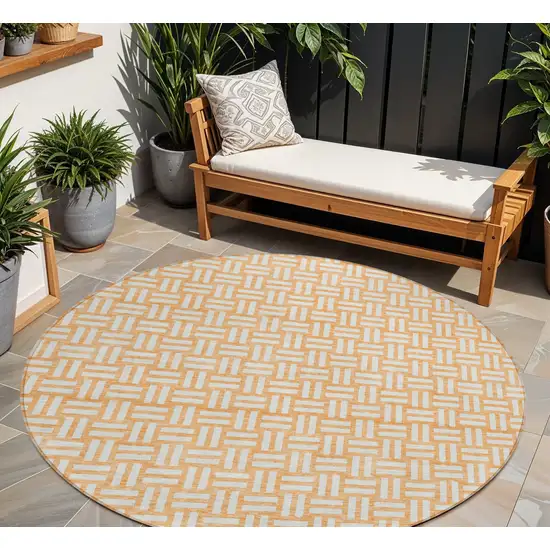 8' Peach And Gray Round Geometric Washable Indoor Outdoor Area Rug Photo 1