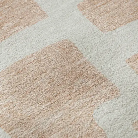 8' Peach And Ivory Abstract Geometric Washable Round Rug With UV Protection Photo 9