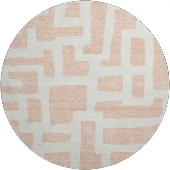 8' Peach And Ivory Abstract Geometric Washable Round Rug With UV Protection Photo 1