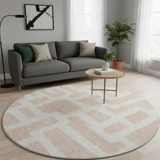 8' Peach And Ivory Abstract Geometric Washable Round Rug With UV Protection Photo 2