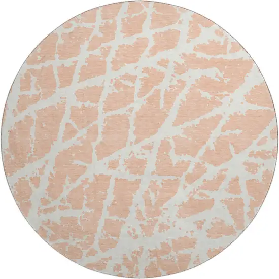8' Peach And Ivory Abstract Washable Round Rug With UV Protection Photo 1