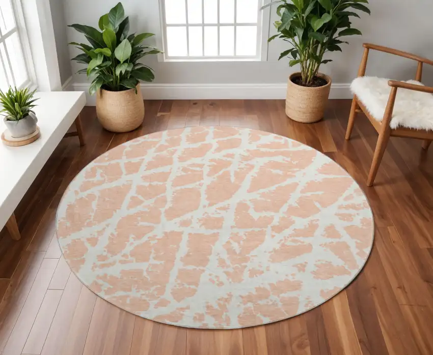 8' Peach And Ivory Abstract Washable Round Rug With UV Protection Photo 2