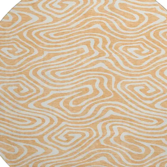 8' Peach And Ivory Abstract Washable Round Rug With UV Protection Photo 2