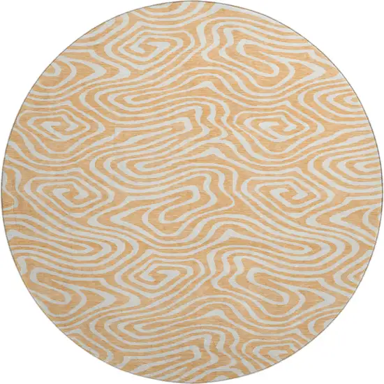 8' Peach And Ivory Abstract Washable Round Rug With UV Protection Photo 1
