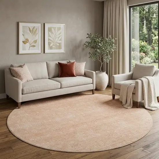 8' Peach And Ivory Floral Washable Round Rug With UV Protection Photo 1