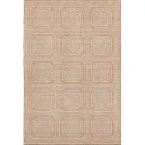 Photo of 8' Peach And Ivory Geometric Washable Area Rug With UV Protection