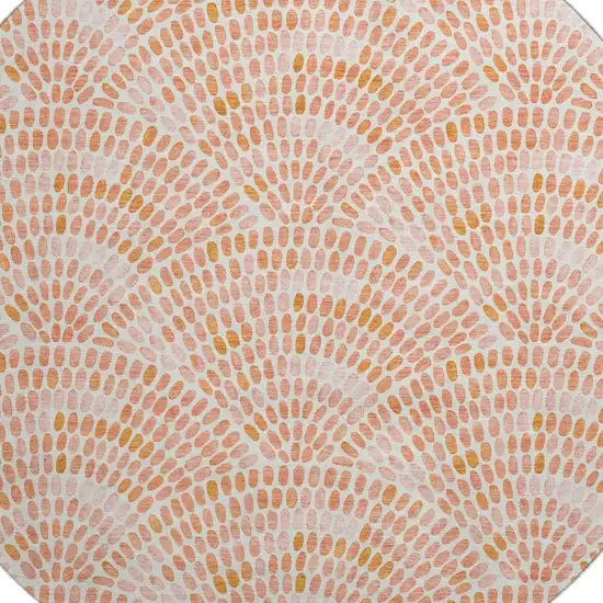 8' Peach And Ivory Geometric Washable Round Rug With UV Protection Photo 3