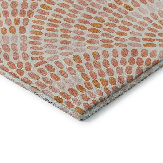 8' Peach And Ivory Geometric Washable Round Rug With UV Protection Photo 7