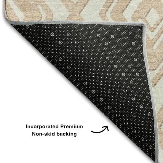 8' Peach And Ivory Geometric Washable Round Rug With UV Protection Photo 7