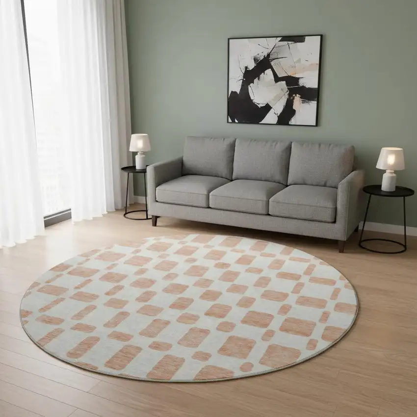 8' Peach And Ivory Geometric Washable Round Rug With UV Protection Photo 2