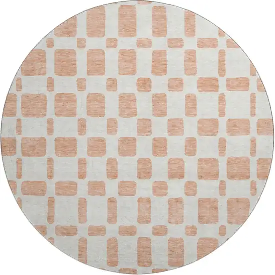 8' Peach And Ivory Geometric Washable Round Rug With UV Protection Photo 1