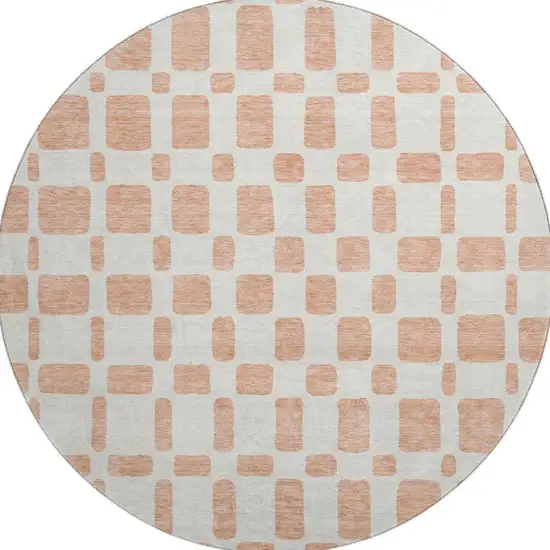 8' Peach And Ivory Geometric Washable Round Rug With UV Protection Photo 4