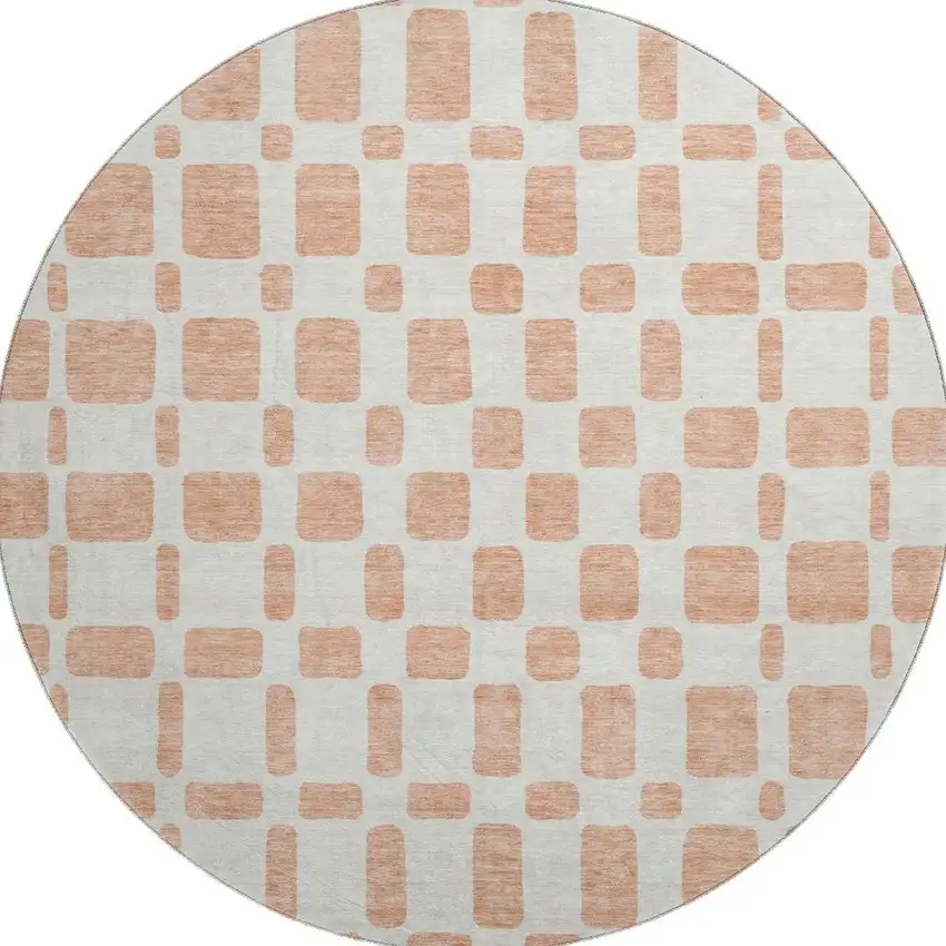 8' Peach And Ivory Geometric Washable Round Rug With UV Protection Photo 4