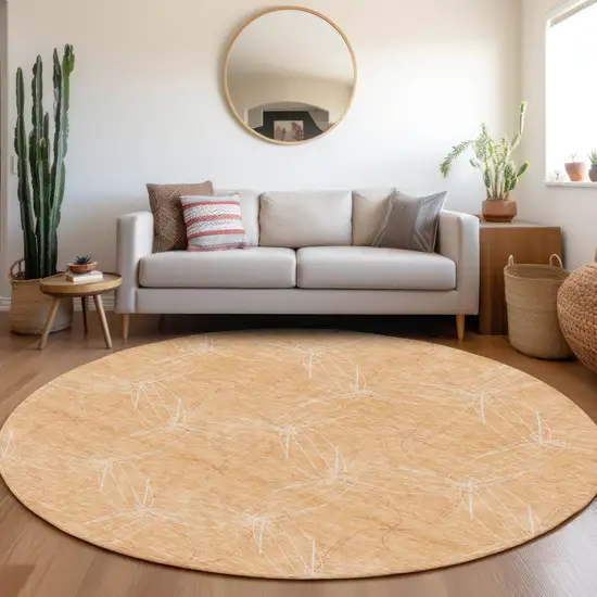 8' Peach And Ivory Geometric Washable Round Rug With UV Protection Photo 4