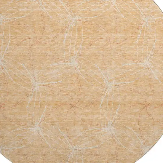 8' Peach And Ivory Geometric Washable Round Rug With UV Protection Photo 2