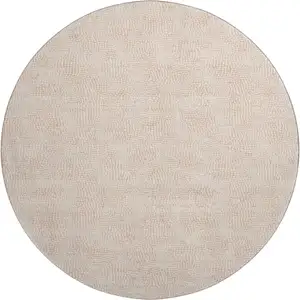 Photo of 8' Peach And Ivory Geometric Washable Round Rug With UV Protection