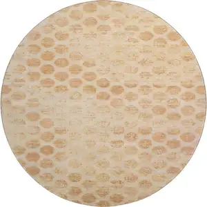 Photo of 8' Peach And Ivory Geometric Washable Round Rug With UV Protection