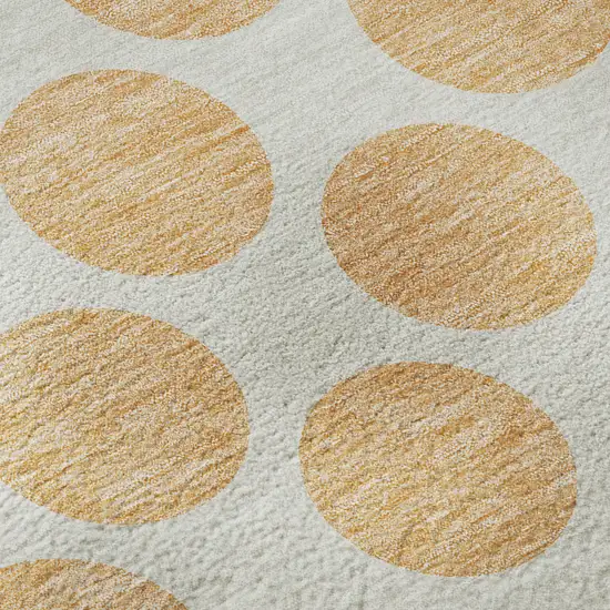 8' Peach And Ivory Polka Dot Washable Round Rug With UV Protection Photo 8