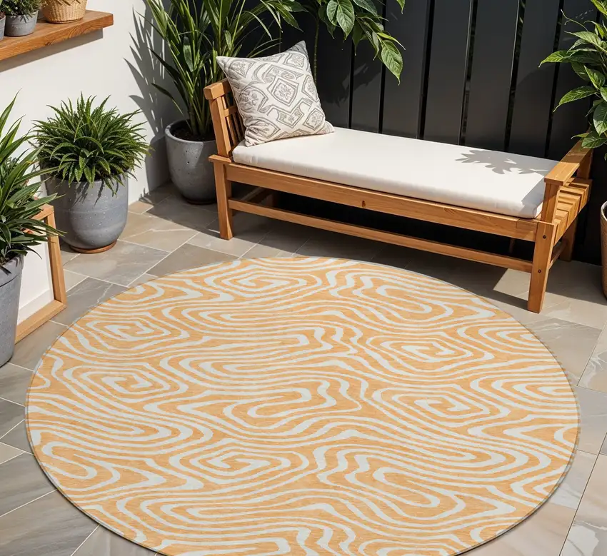 8' Peach And Ivory Round Abstract Washable Indoor Outdoor Area Rug Photo 1
