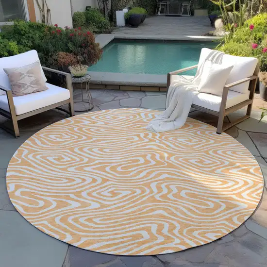 8' Peach And Ivory Round Abstract Washable Indoor Outdoor Area Rug Photo 6