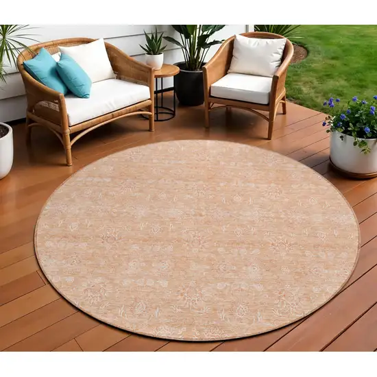 8' Peach And Ivory Round Floral Washable Indoor Outdoor Area Rug Photo 1