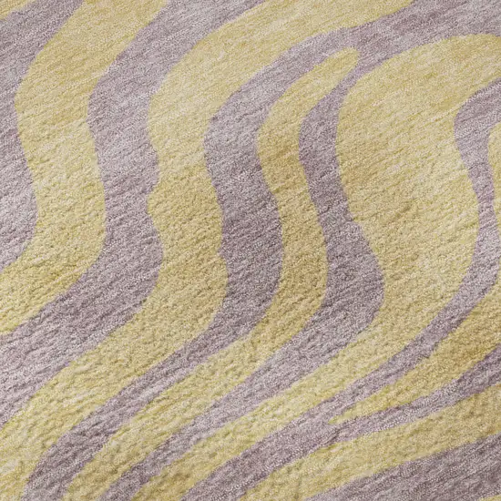 8' Peach And Lavender Animal Print Washable Round Rug With UV Protection Photo 8