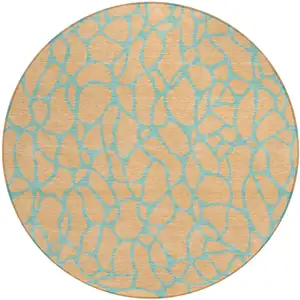 Photo of 8' Peach And Mint Green Round Geometric Washable Indoor Outdoor Area Rug