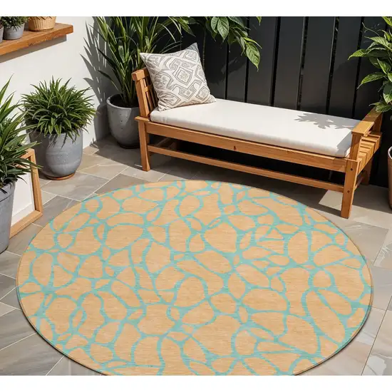 8' Peach And Mint Green Round Geometric Washable Indoor Outdoor Area Rug Photo 1