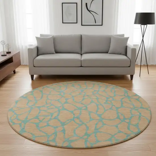 8' Peach And Teal Geometric Washable Round Rug With UV Protection Photo 2