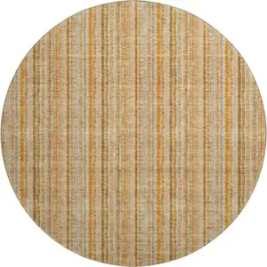 Photo of 8' Peach Beige And Orange Striped Washable Round Rug With UV Protection