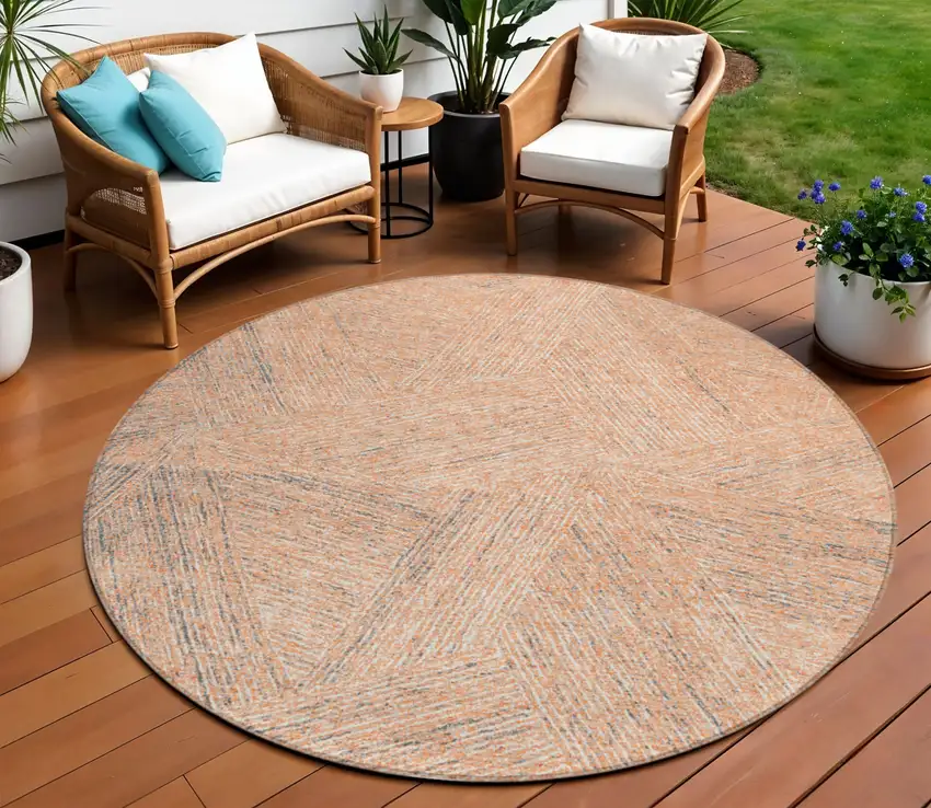 8' Peach Blue And Ivory Round Abstract Washable Indoor Outdoor Area Rug Photo 1