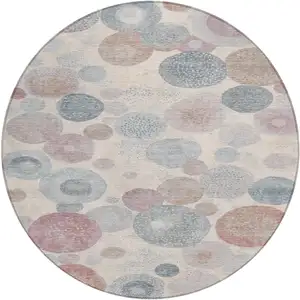 Photo of 8' Peach Gray And Denim Blue Round Geometric Washable Indoor Outdoor Area Rug